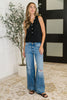 Buttoned Up Buttercup Sleeveless Top in Black